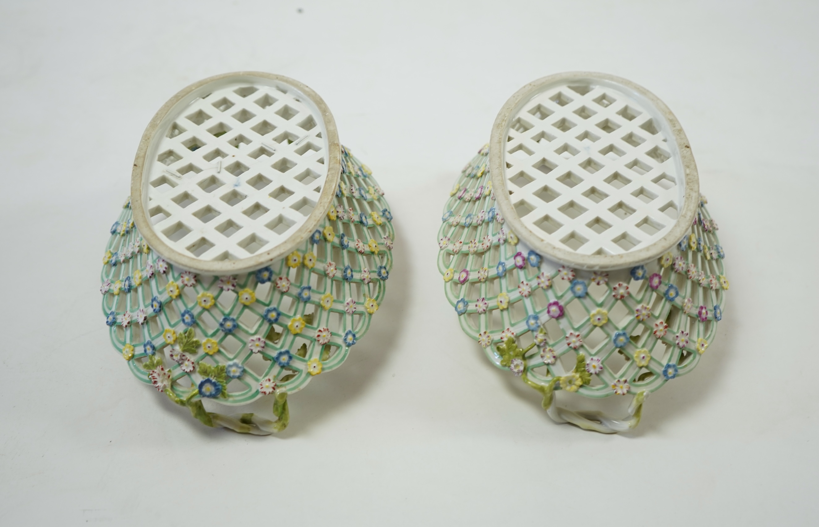 A pair of mid 18th century Meissen porcelain reticulated baskets c.1765